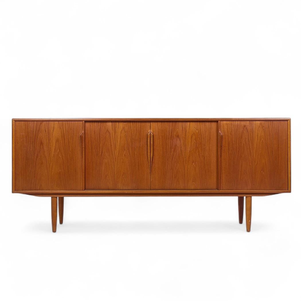 Axel Christensen Mid Century Danish Teak Credenza

This credenza measures: 78.75 wide x 18.25 deep x 32.5 inches high

All pieces of furniture can be had in what we call restored vintage condition. That means the piece is restored upon purchase so