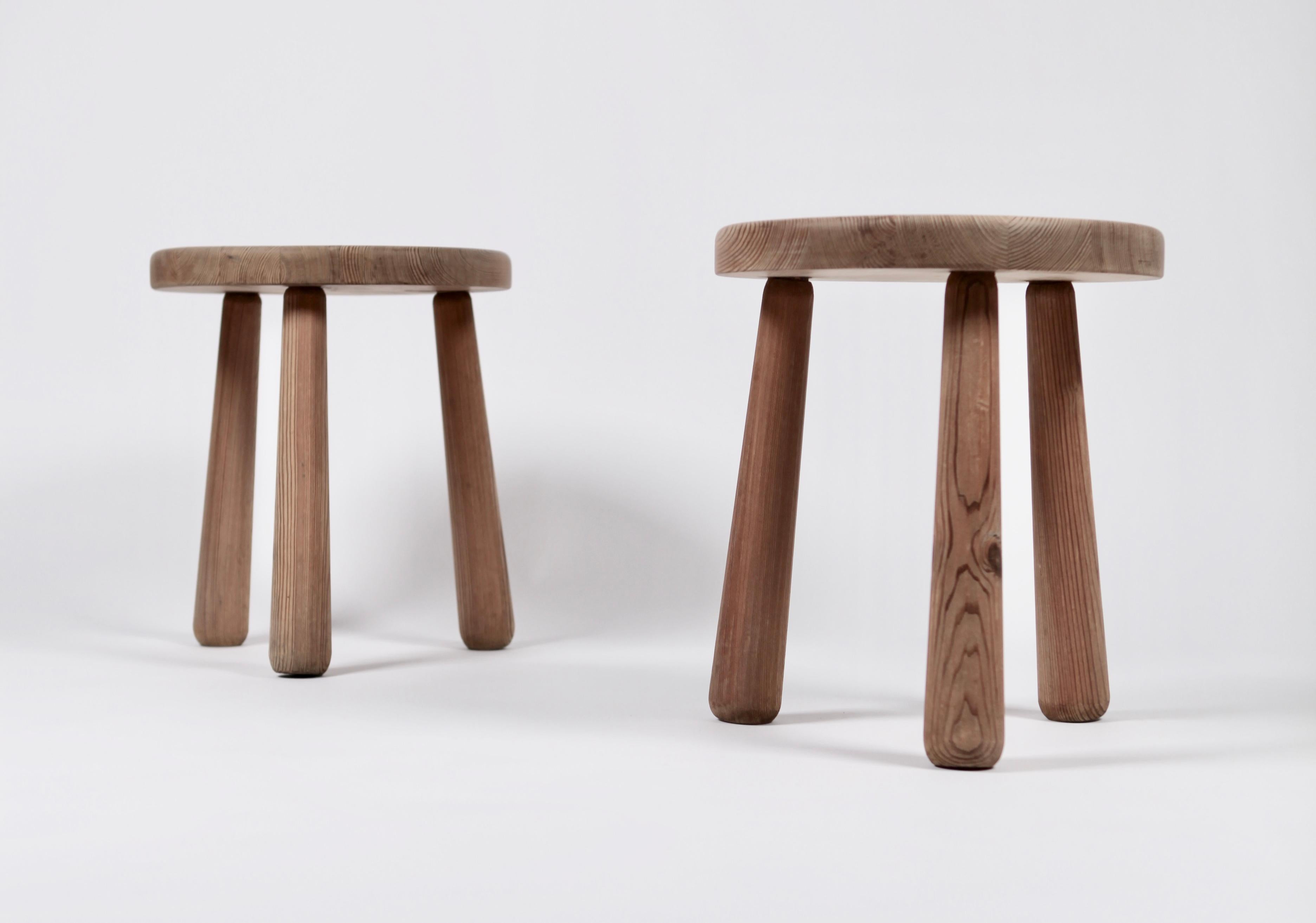 A rare pair of Utö stools by Axel Einar Hjorth.
Executed in 1932 solid stained pine.
Early model with hand carved legs in excellent vintage condition.
Manufactured by Nordiska Kompaniet in Sweden, 1932.
Lit: Signum, Axel Einar Hjorth,