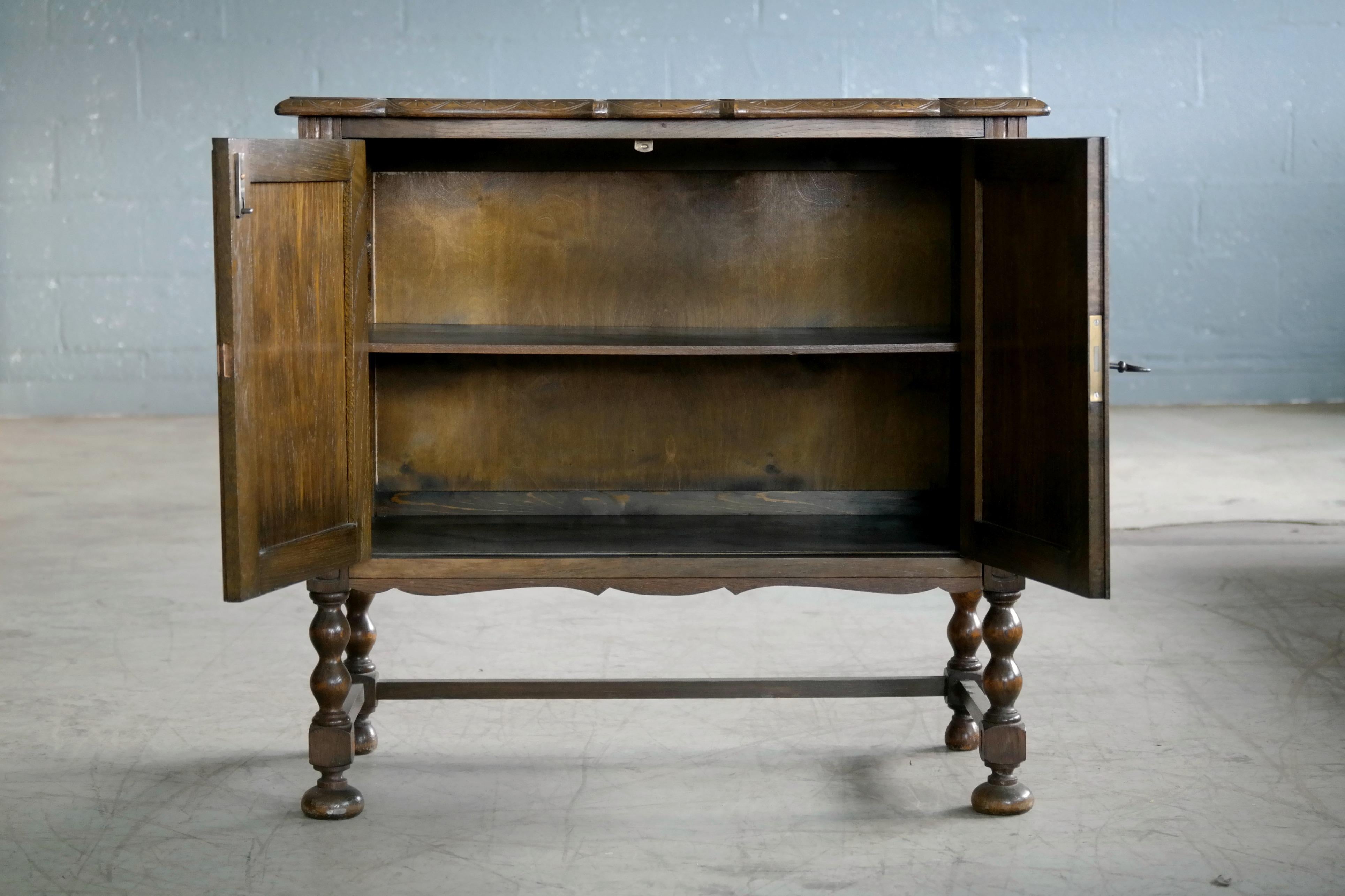 Mid-20th Century Axel Einar Hjorth Attributed Small Console or Cabinet in Stained Oak circa 1940s