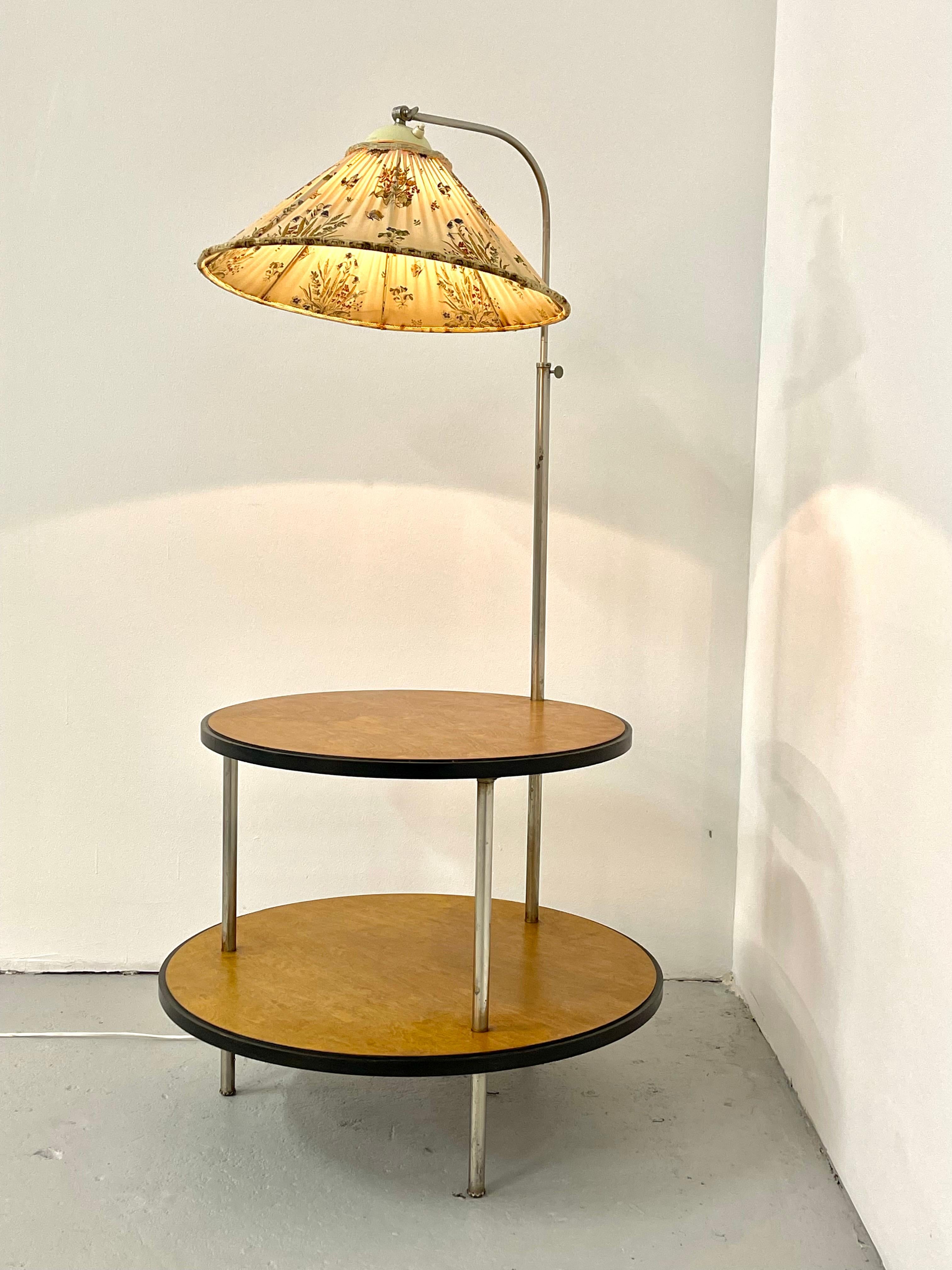 A rare adjustable light arm table, designed by Axel Einar Hjorth 1934, executed by Nordiska Kompaniet in Stockholm. Tubular steel and round birch trays, diameter 55 & 65 cm.
Maximum height of the adjustable light arm 135cm.
the table height is 52
