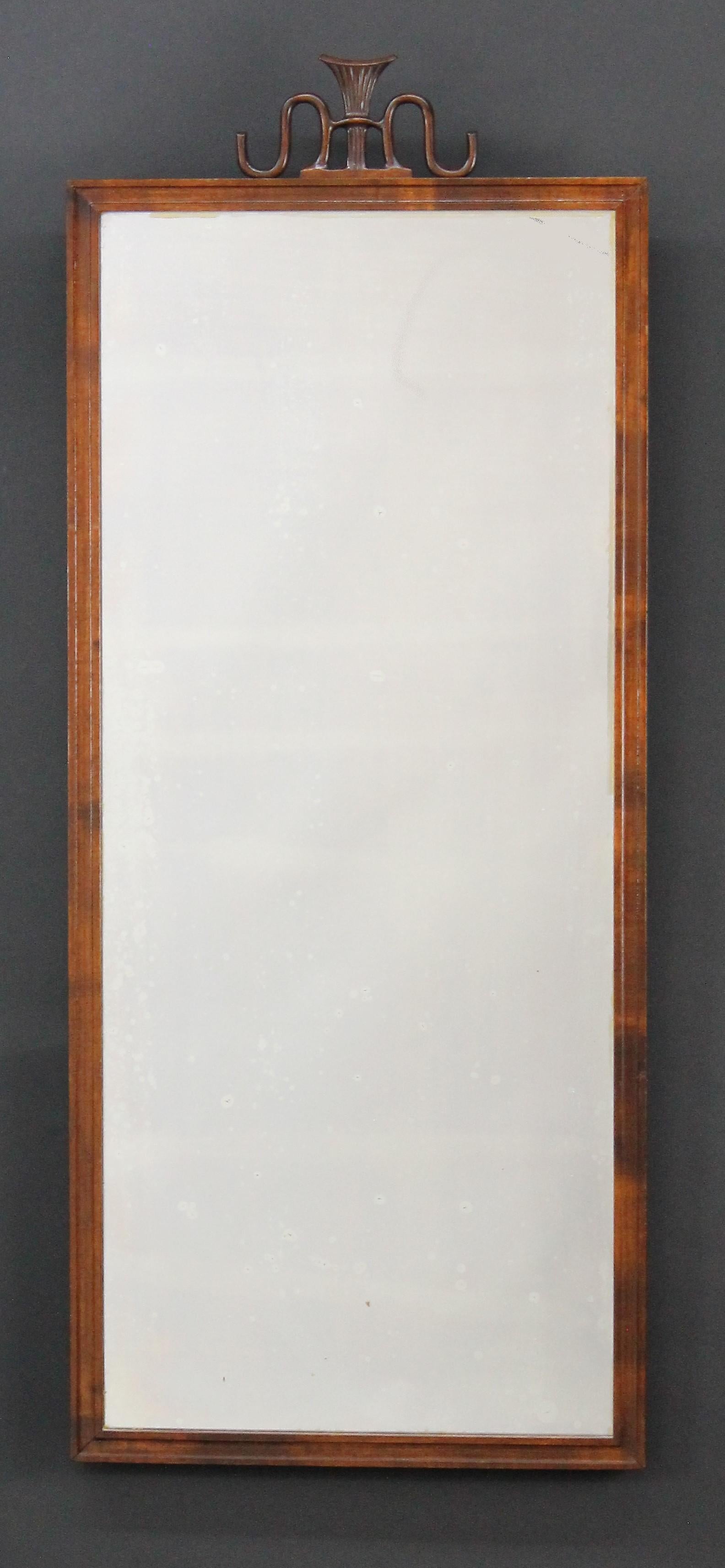 A very stylish Swedish Grace mirror. 
Designed by the Swedish icon Axel Einar Hjorth (1888-1959) for Svenska Möbel Fabrikerna i Bodafors.

Made in birch. With the original mirror plate. 
The plate shows signs of age. It can of course be very