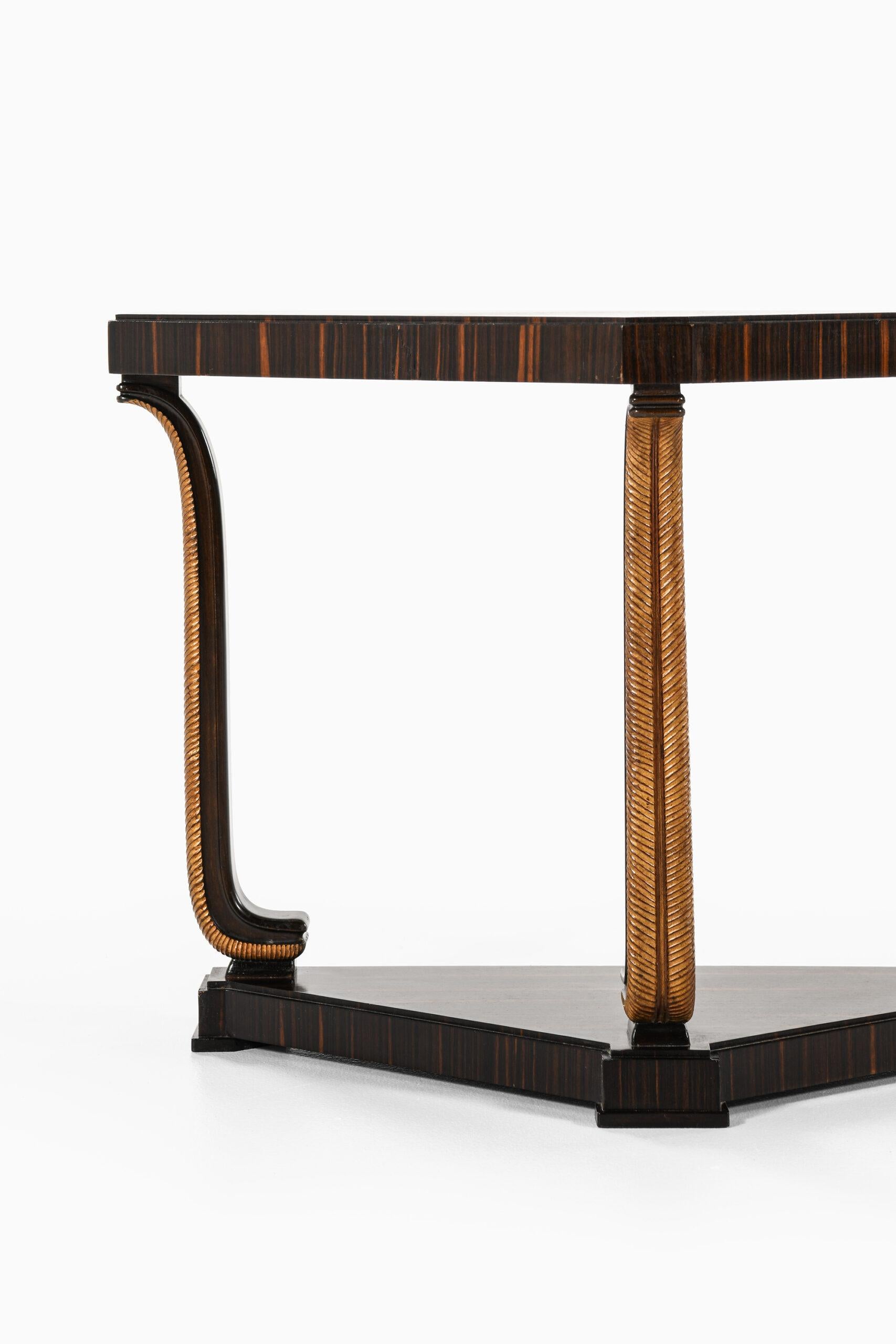 Very rare console table model Louis designed by Axel Einar Hjorth. Produced by Nordiska Kompaniet in Sweden.