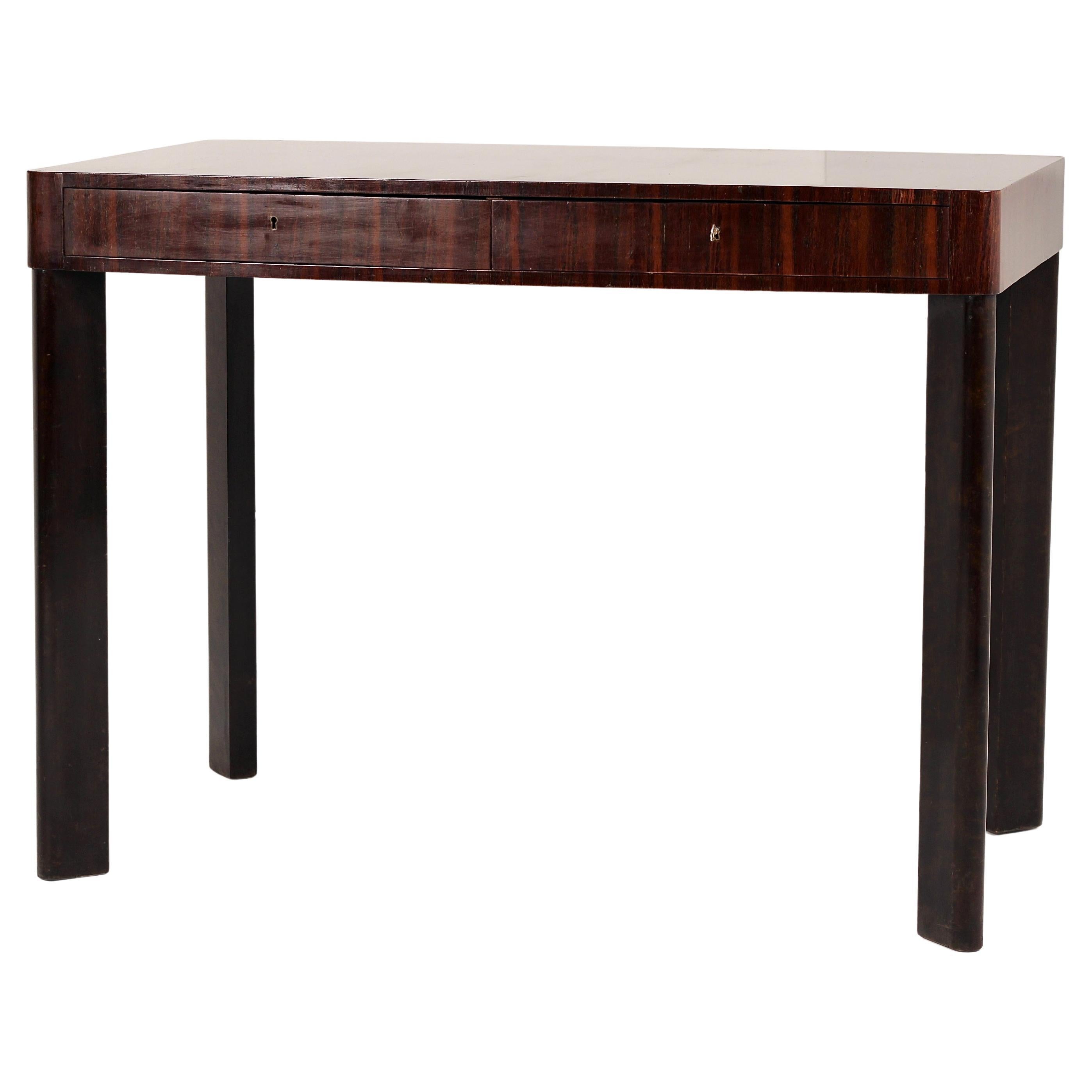 Axel Einar Hjorth Console Table — Bertil Series, Nordiska Kompaniet, 1934

Sweden, Macassar Ebony Veneer, with Original NK Plaque

This rare console table was designed by Axel Einar Hjorth (1888–1959), one of Sweden’s most influential furniture