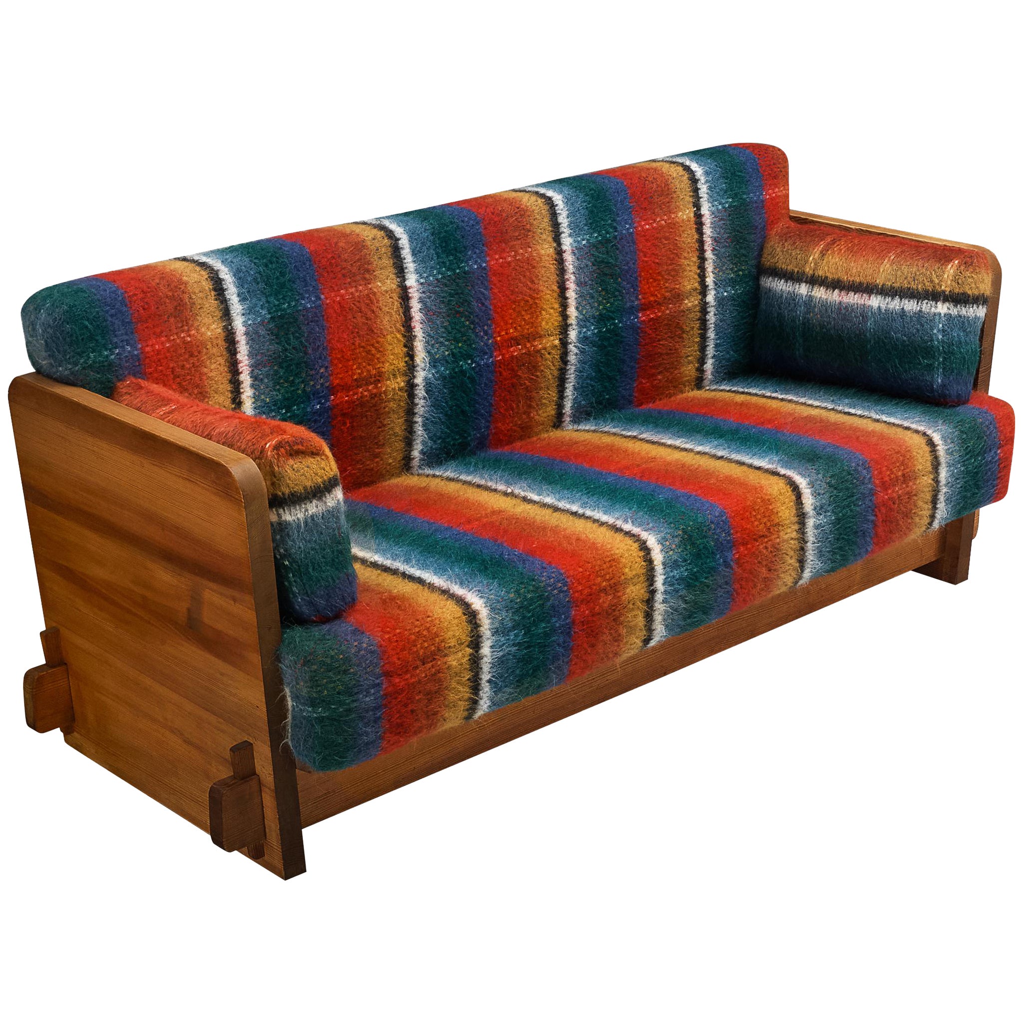 What is the difference between high-back and low-back sofas?