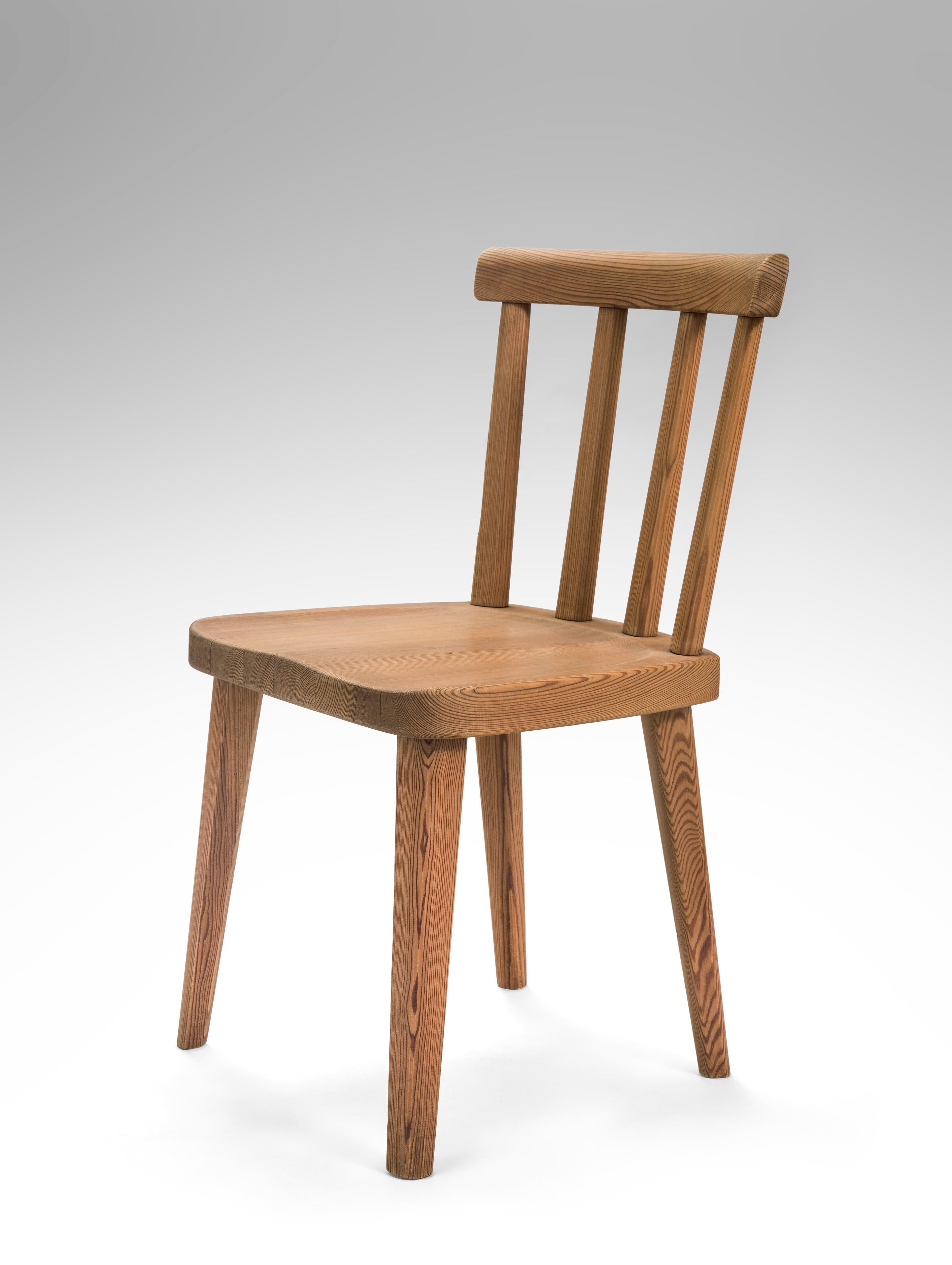 Axel-Einar Hjorth, for Nordiska Kompaniet, 
Set of 4 Uto Solid Pine Chairs
Early 20th century
A straight forward, comfortable and solidly constructed chair. The concave top rail raised on four rounded back splats, above a contoured seat,