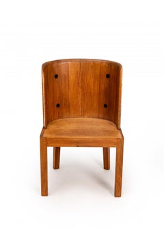 Axel Einar Hjorth "Lovo" armchair, stained pine and iron rivets