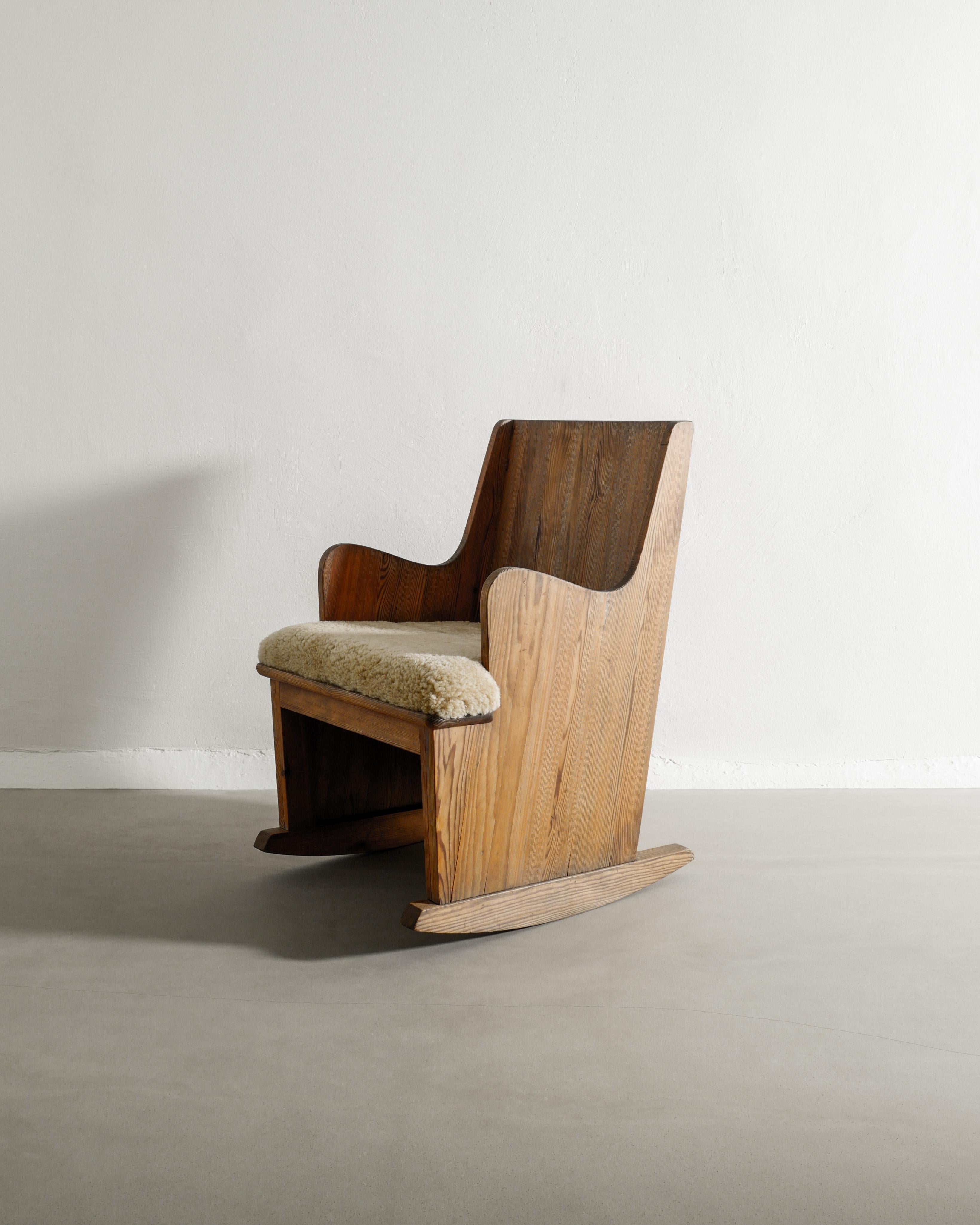 Very rare and early Swedish mid century modern wooden rocking chair model 