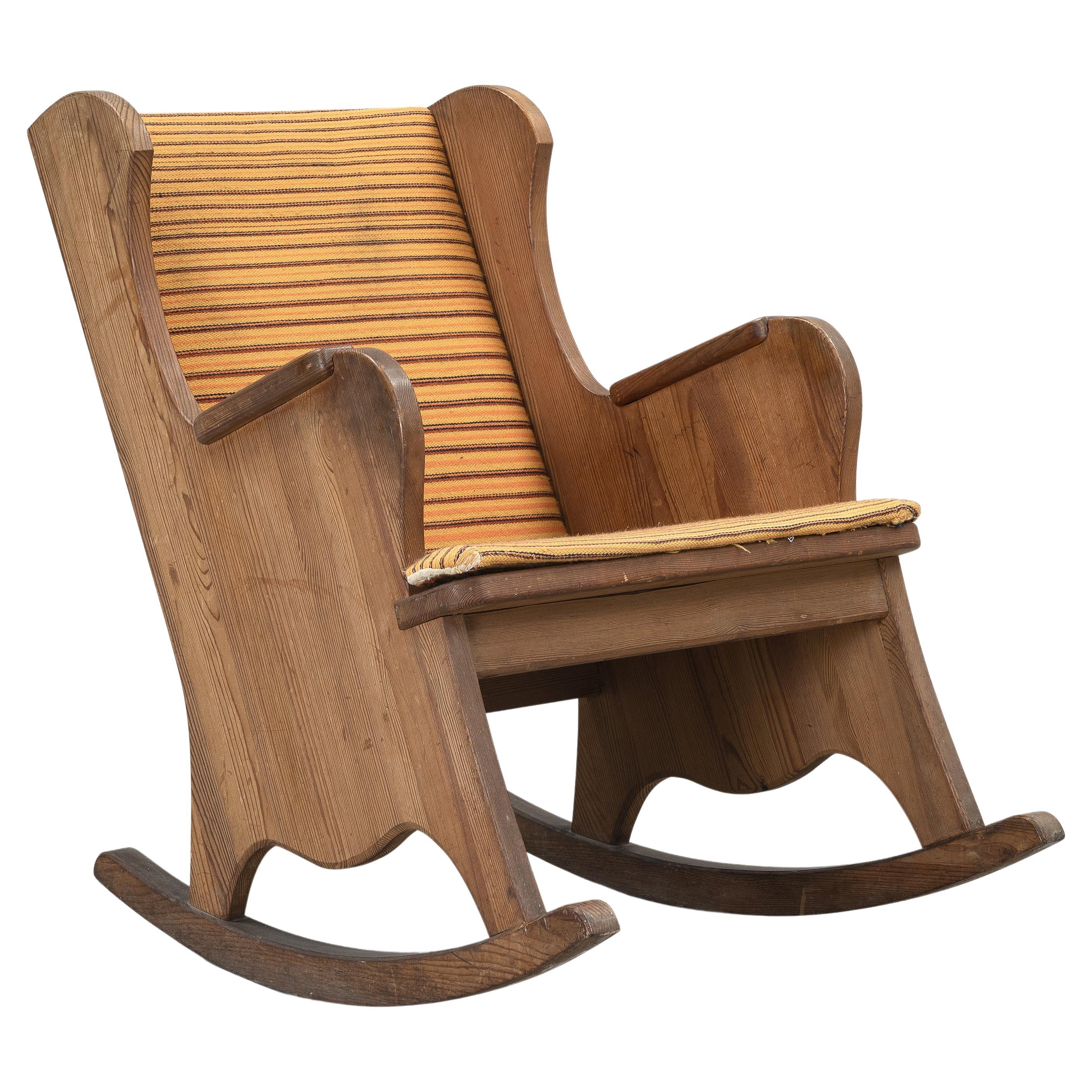 Axel Einar Hjorth "Lovö" Rocking Chair in Solid Pine Produced in Sweden, 1930s 