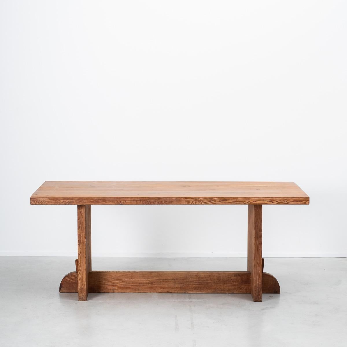 A Swedish Pine Lovö dining table designed by Axel Einar Hjorth for Nordiska Kompaniet in the 1930s. Hjorth was major contributor to the burgeoning Swedish design culture that was recognized internationally in the 1920s. He effectively introduced