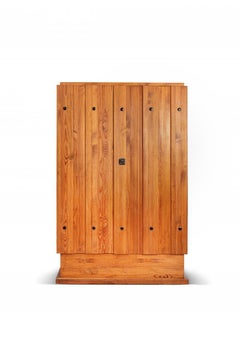 Axel Einar Hjorth Rare "Lovö" cabinet in stained pine wood