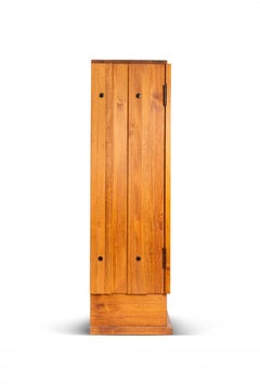 Axel Einar Hjorth Rare "Lovö" cabinet in stained pine wood