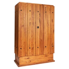 Axel Einar Hjorth Rare "Lovö" cabinet in stained pine wood
