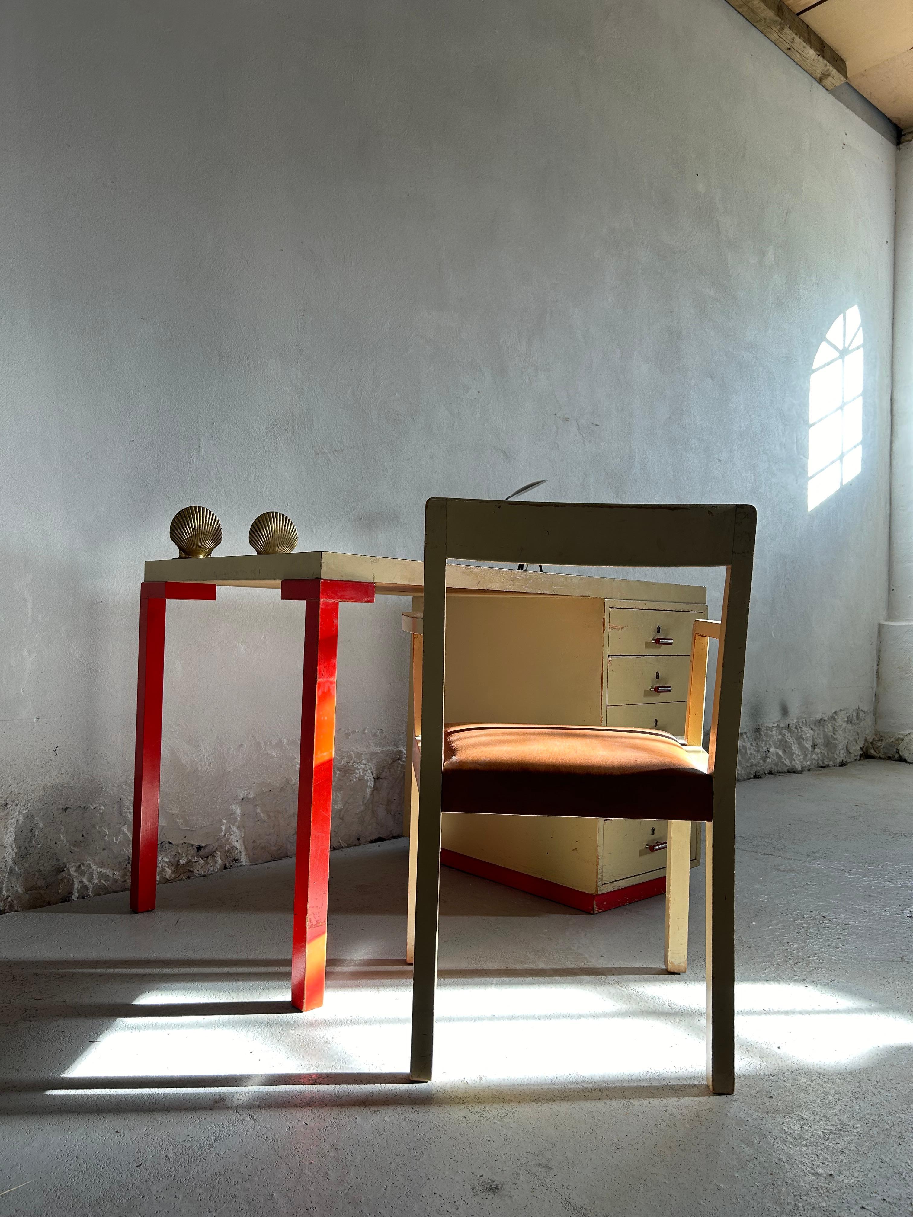 Rare and important Axel Einar Hjorth desk and armchair from the Sibylla series in the original white and red lacquer, the chair has the original white lacquer and has been reupholstered in natural colored Niger goat leather by a Danish