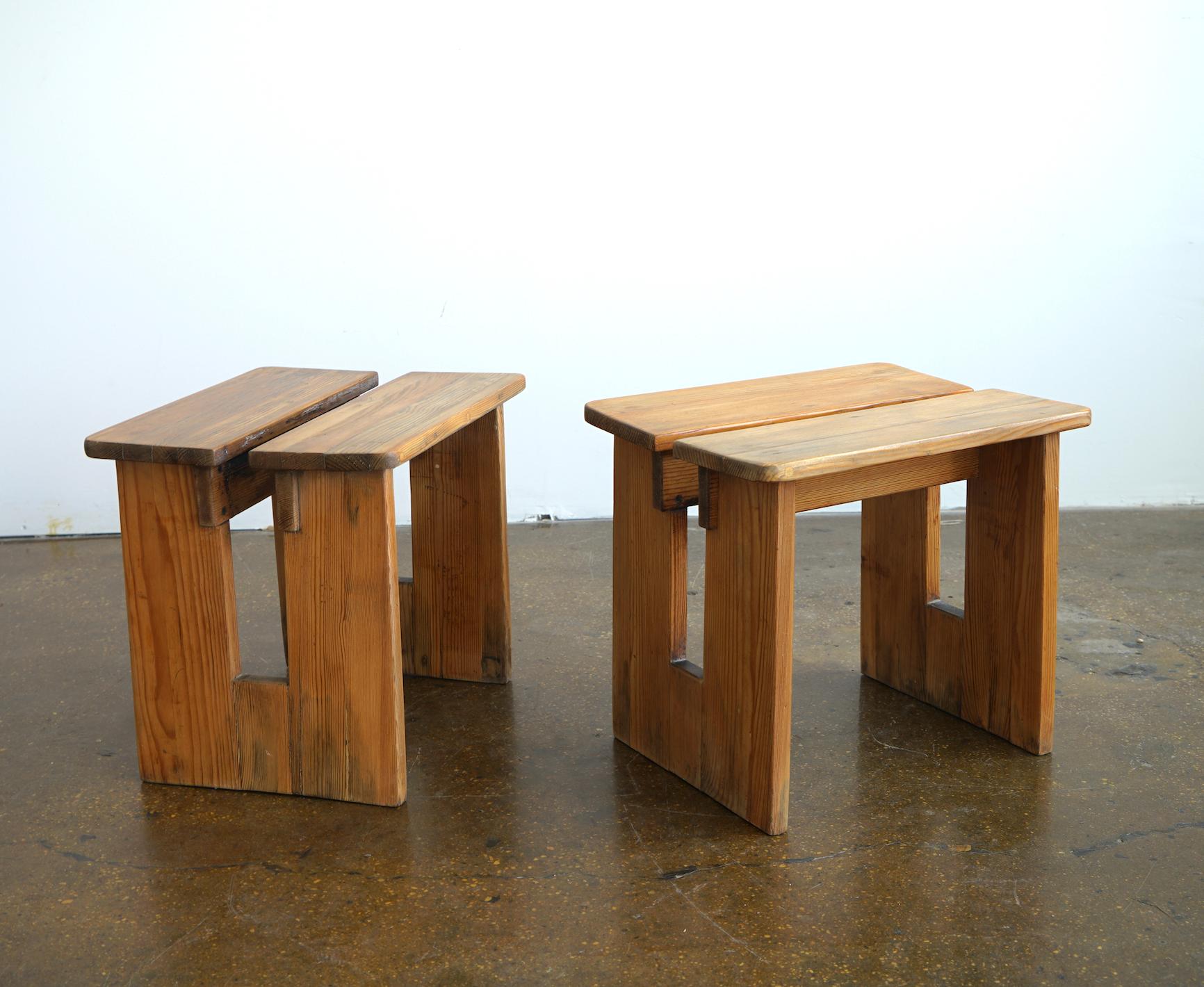 A pair of oiled pine stools designed by Axel Einnar Hjorth for Nordiska Kompaniet, model 