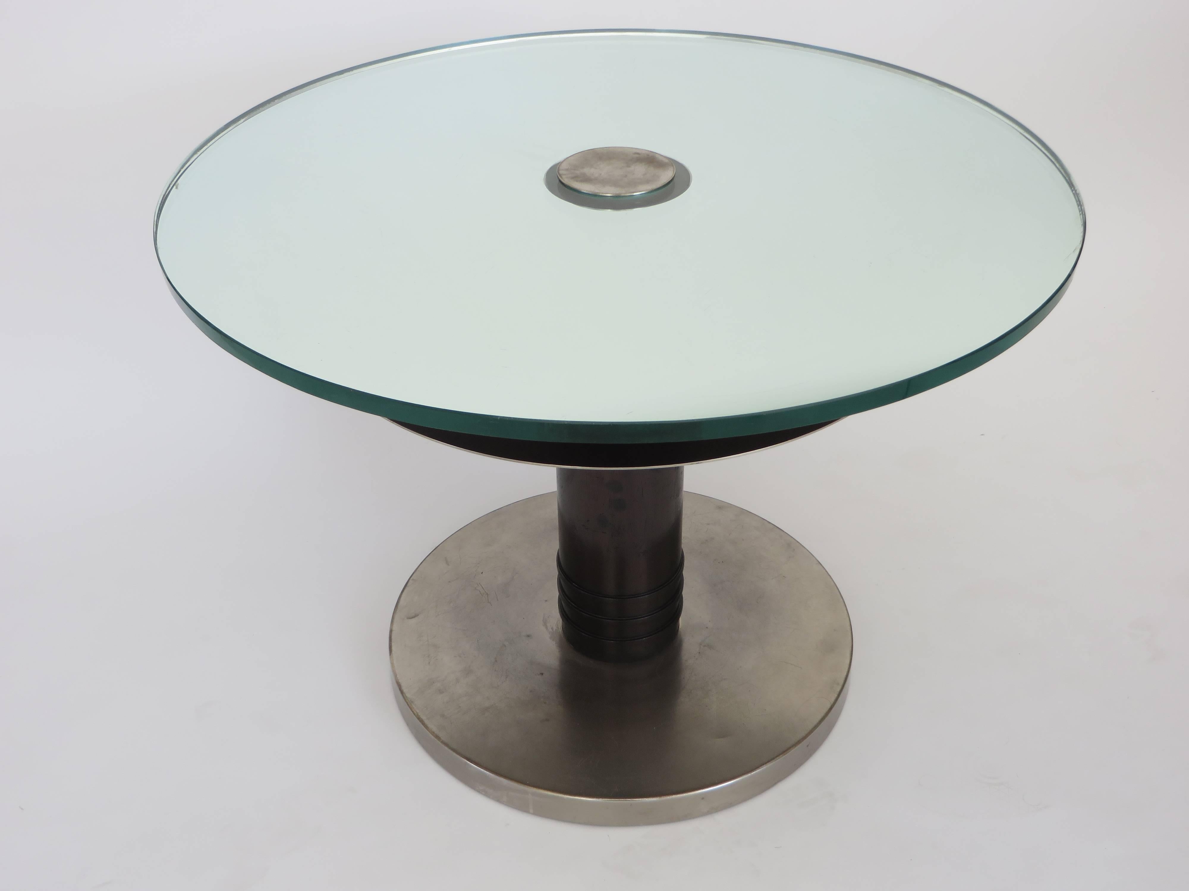 Axel Einar Hjorth rare occasional table Typenko from 1931.
Pictured in Axel Einar Hjorth: Mobilarkhiteckt, Bjork, Ekstrom, Ericson,
p123 a similar form.
This table has patina from its age and use. The mirrored glass is in excellent condition. No