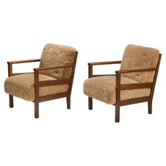 Vintage Axel Einar Hjorth, "Wärmdö" Lounge Chairs, Pine, Shearling, NK, Sweden, 1942