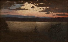 Nightfall over Lake and Rolling Mountain Landscape