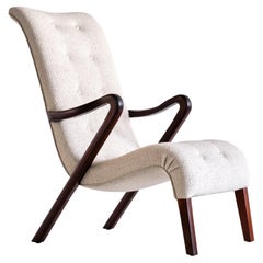 Vintage Axel Larsson Armchair in Bouclé and Mahogany, Sweden, 1940s