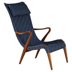 Axel Larsson per Svenska Möbelfabrikerna Lounge Chair in pelle e teak