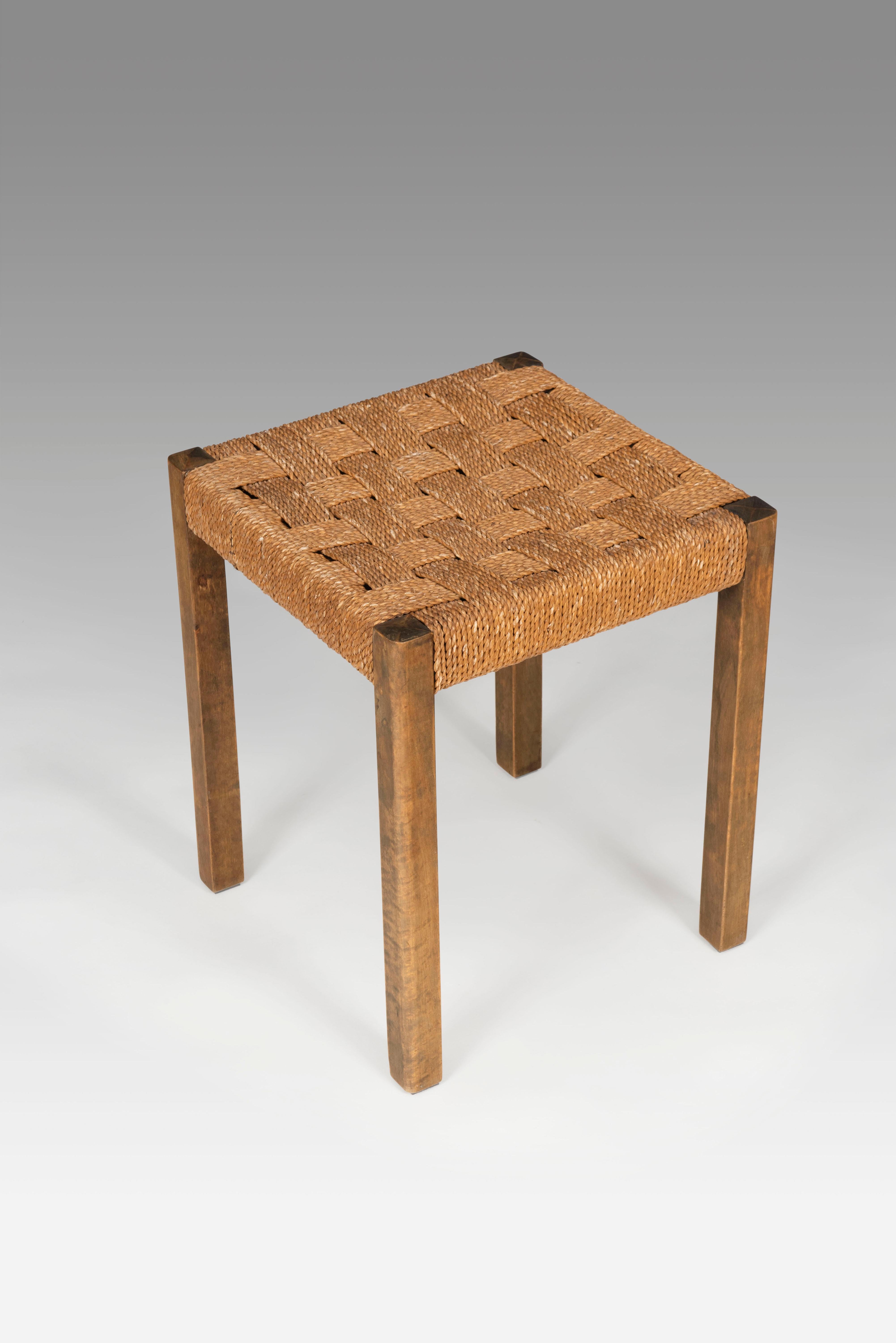 A stool by Axel Larsson for Svenska Möbelfabriken (SMF) Bodafors, designed circa 1929. The stool is made of stained beech with seagrass. Gently restored.
 