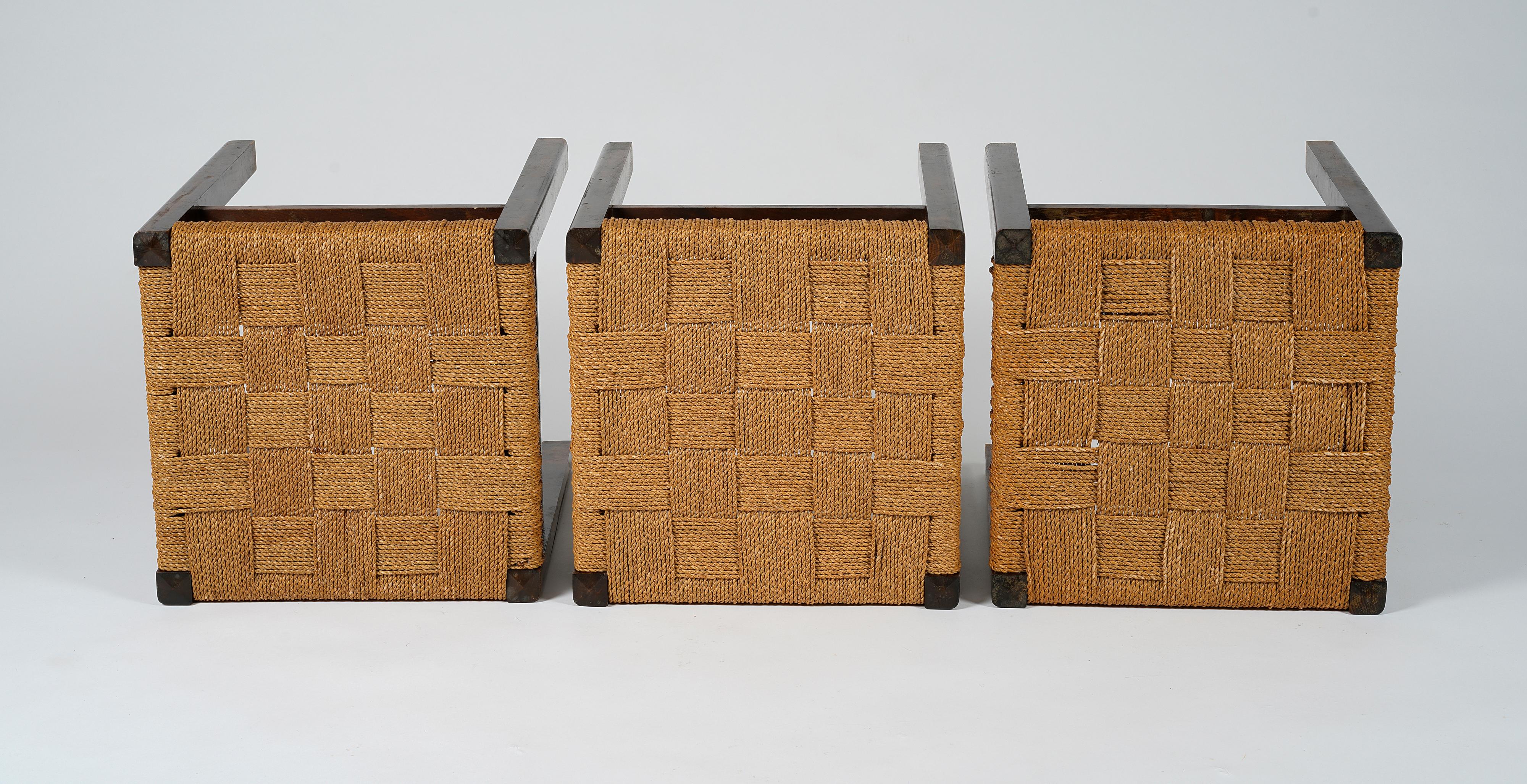 Scandinavian Modern Axel Larsson, set of three stools in stained birch and woven seagrass, 1930s For Sale