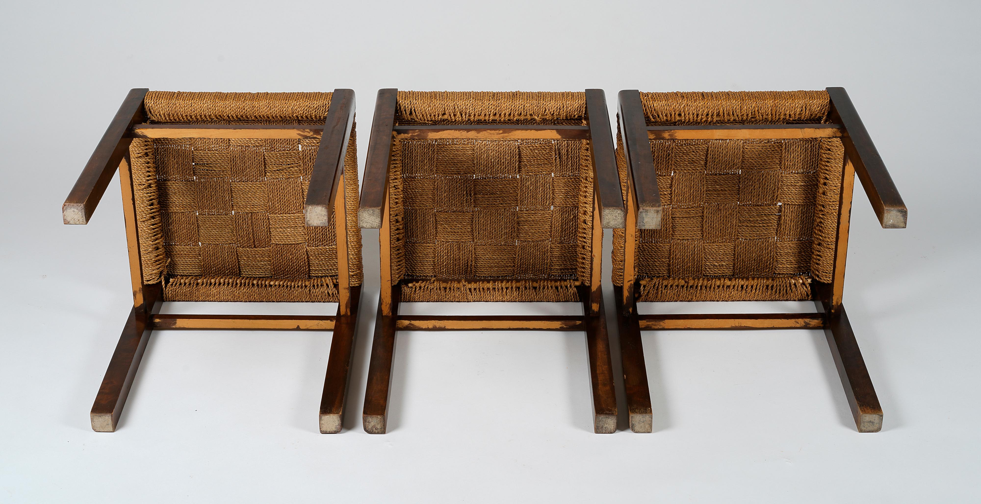 Mid-20th Century Axel Larsson, set of three stools in stained birch and woven seagrass, 1930s For Sale
