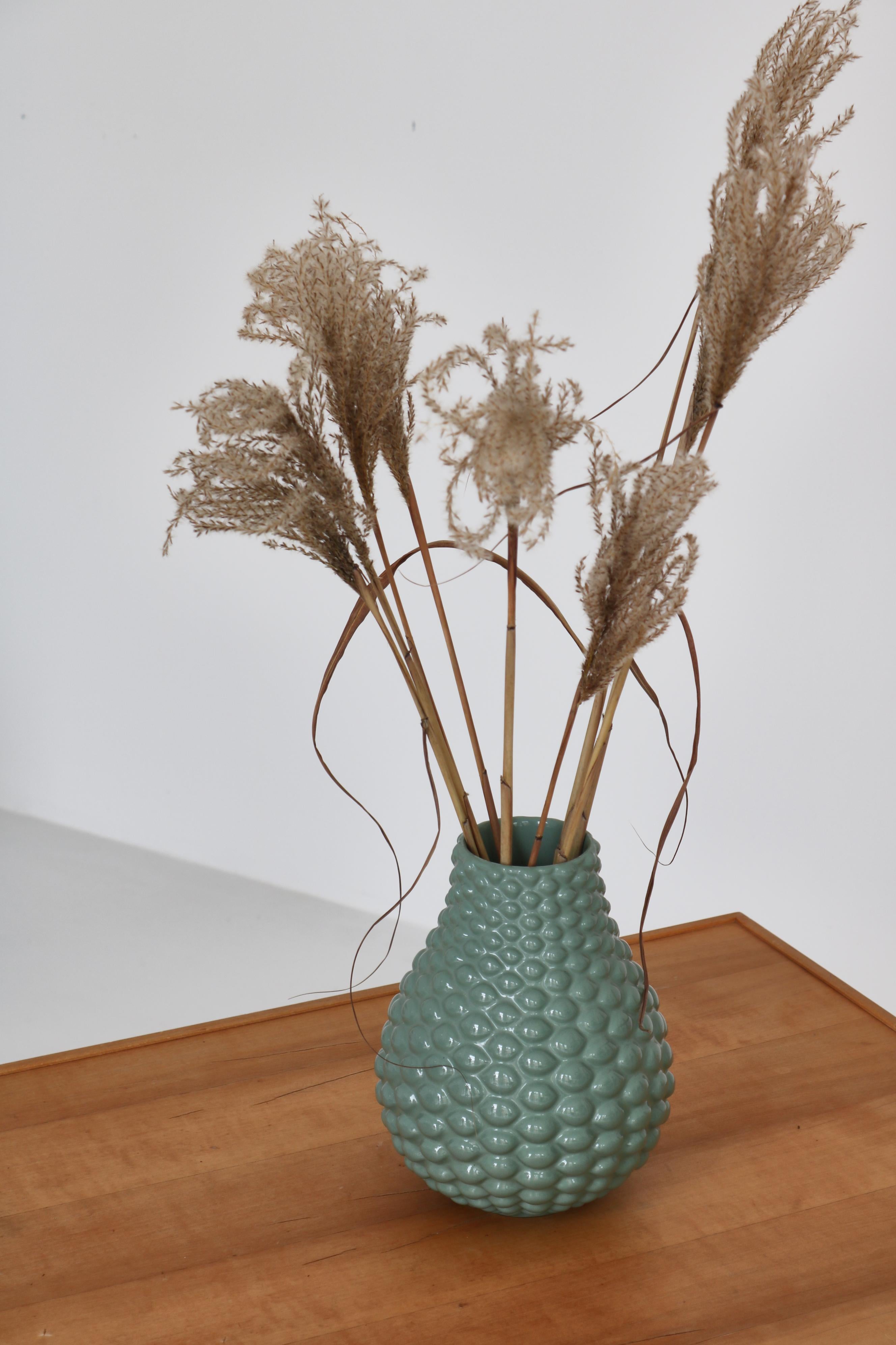 Rare and iconic budded vase by Danish master of stoneware Axel Salto in terra-cotta and celadon green glaze. Made at the terracotta manufacturer 