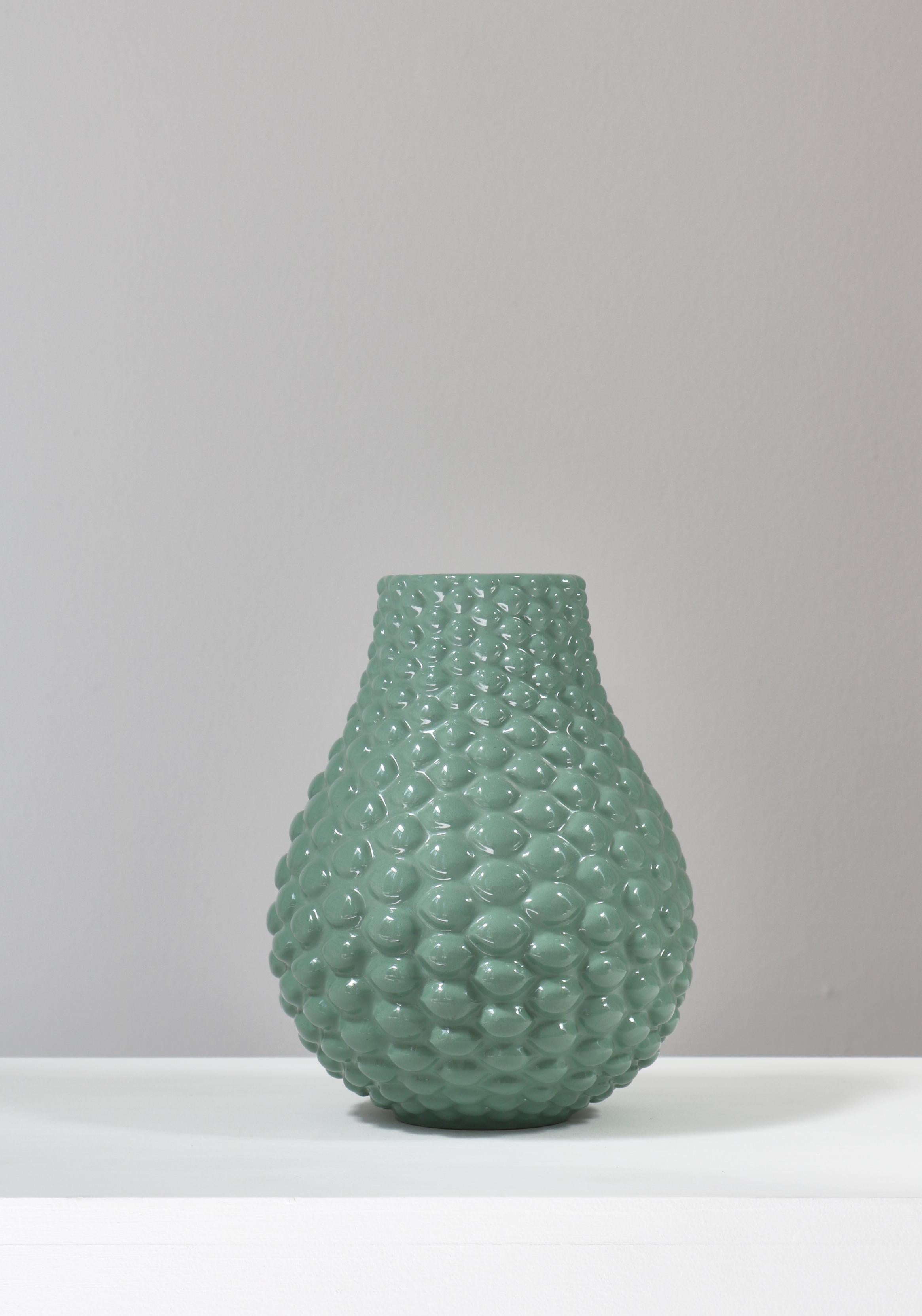 Rare and iconic budded vase by Danish master of stoneware Axel Salto in terra-cotta and celadon green glaze. Made at the terracotta manufacturer 