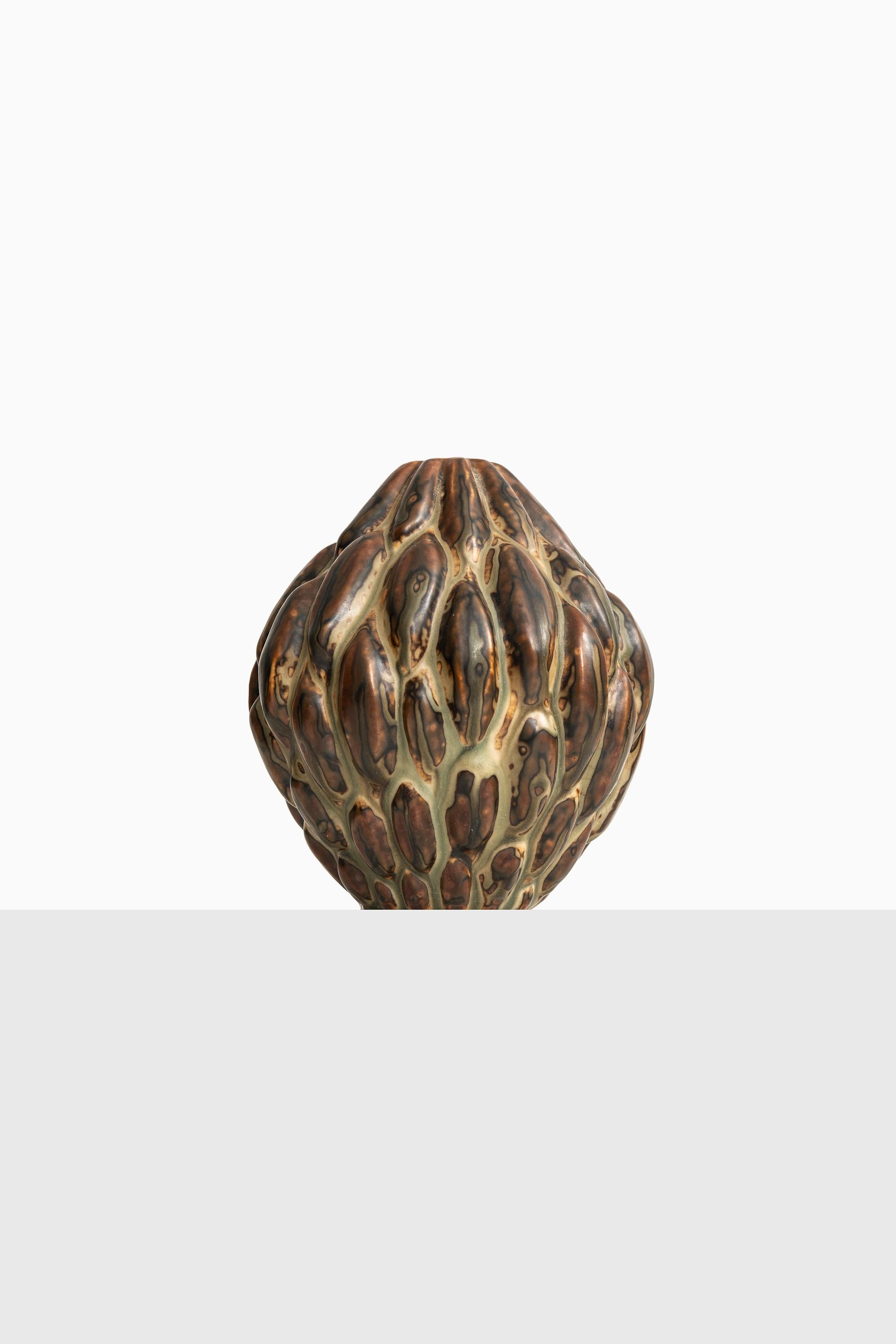 Rare ceramic vase designed by Axel Salto. Produced for Royal Copenhagen in Denmark.