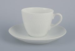 Axel Salto for Royal Copenhagen. Four pairs of coffee cups in white porcelain.