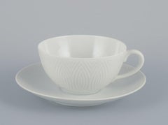 Axel Salto for Royal Copenhagen. Four pairs of teacups in white porcelain.