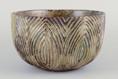 Axel Salto for Royal Copenhagen. Impressive large ceramic bowl. Fluted design.