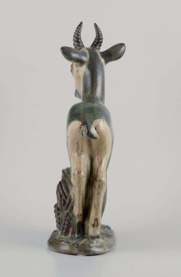 Glazed Axel Salto for Royal Copenhagen. Large and impressive ceramic sculpture of deer For Sale