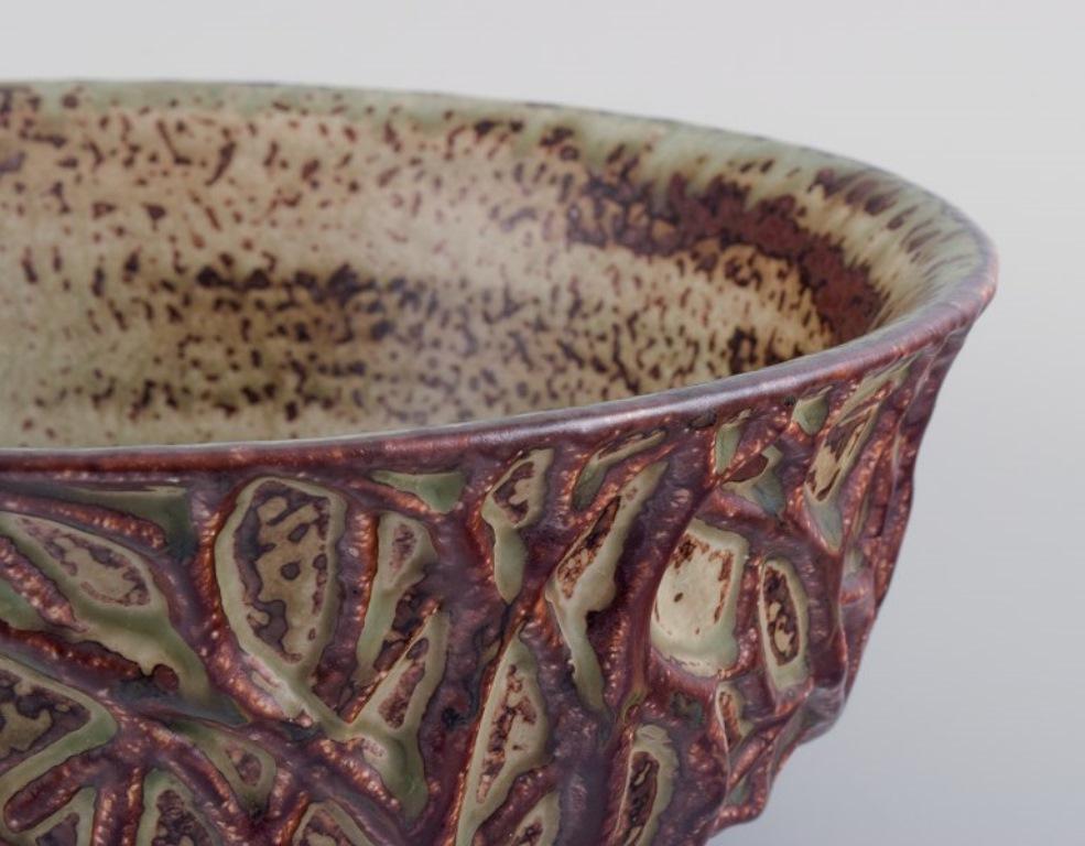 Glazed Axel Salto for Royal Copenhagen. Large ceramic bowl designed with leaf patterns  For Sale