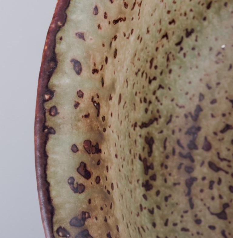 Late 20th Century Axel Salto for Royal Copenhagen. Large ceramic bowl designed with leaf patterns  For Sale