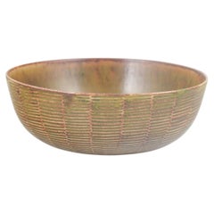 Axel Salto for Royal Copenhagen. Low stoneware bowl with ribbed surface.