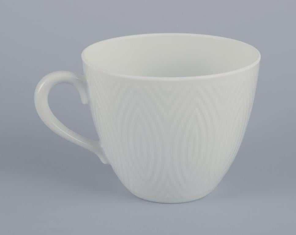 Axel Salto für Royal Copenhagen. Sechs Paar Kaffeebecher aus weißem Porzellan. (Mitte des 20. Jahrhunderts) im Angebot