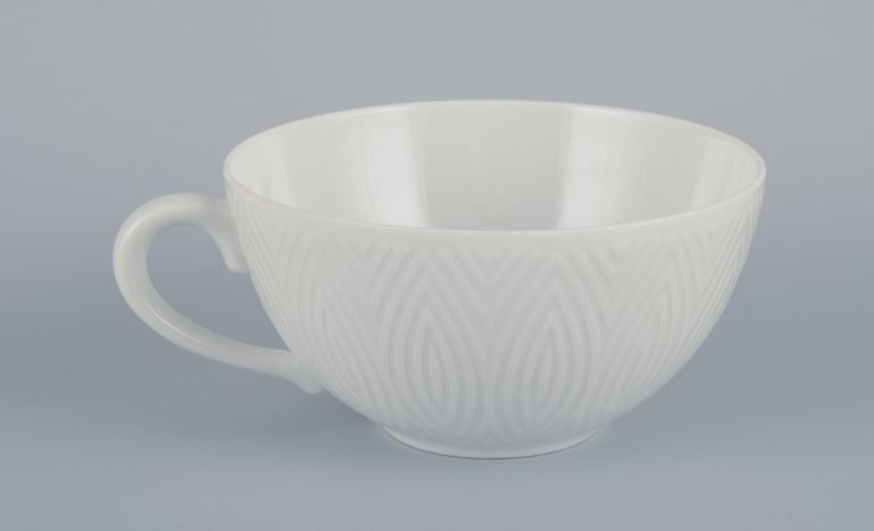 Axel Salto para Royal Copenhagen. Tres pares de tazas de té de porcelana blanca. mediados del siglo XX en venta