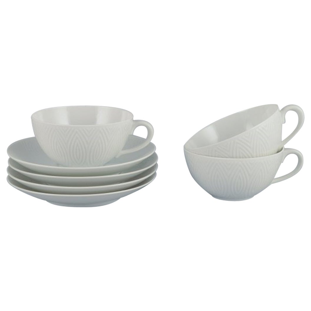 Axel Salto for Royal Copenhagen. Three pairs of teacups in white porcelain.