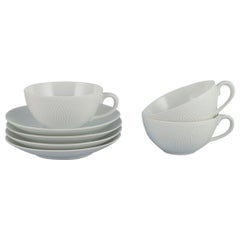 Axel Salto for Royal Copenhagen. Three pairs of teacups in white porcelain.