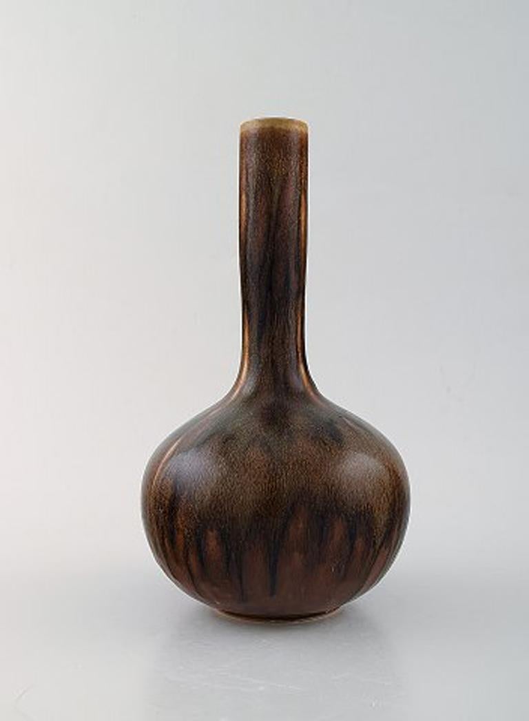 Axel Salto for Royal Copenhagen. Vase in glazed stoneware. Beautiful glaze in chestnut colored shades. Long-necked shape. 1940s-1950s.
Signed: Salto.
In perfect condition. 1st factory quality.
Measures: 24.5 x 14 cm.