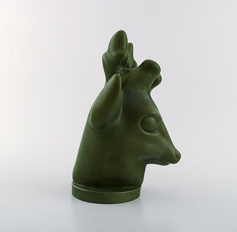 Axel Salto for the Ipsens widow. Art Deco deer head in dark green glaze. Glazed stoneware / ceramics. Model No. 36, 1930s.
Stamped: Salto.
In very good condition.
Measures: 23 x 16 cm.