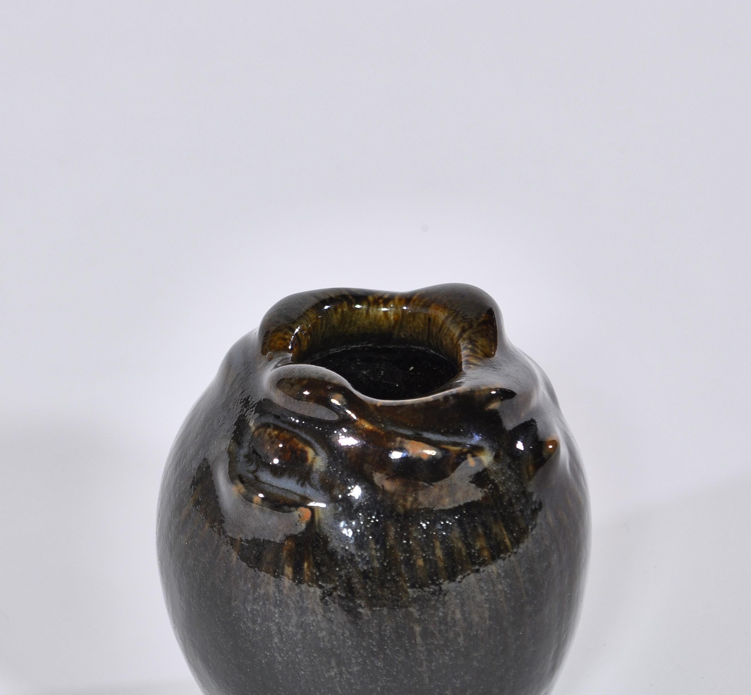 Stunning stoneware vase from 1957 by Danish artist Axel Salto. Beautiful dark brown glaze. Factory first in mint condition. Signed.