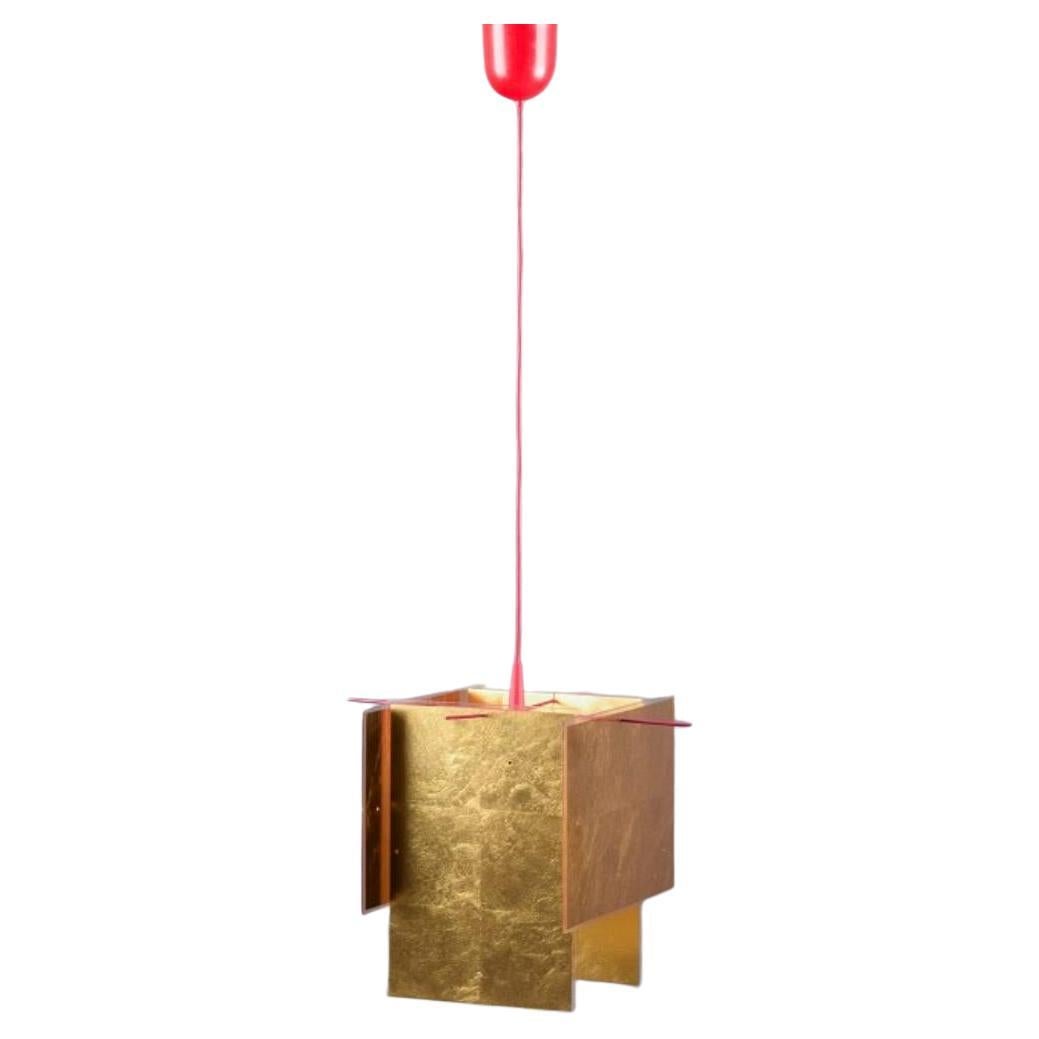 Axel Schmid per Ingo Maurer. Pendente da soffitto con montatura in metallo laccato rosso. in vendita