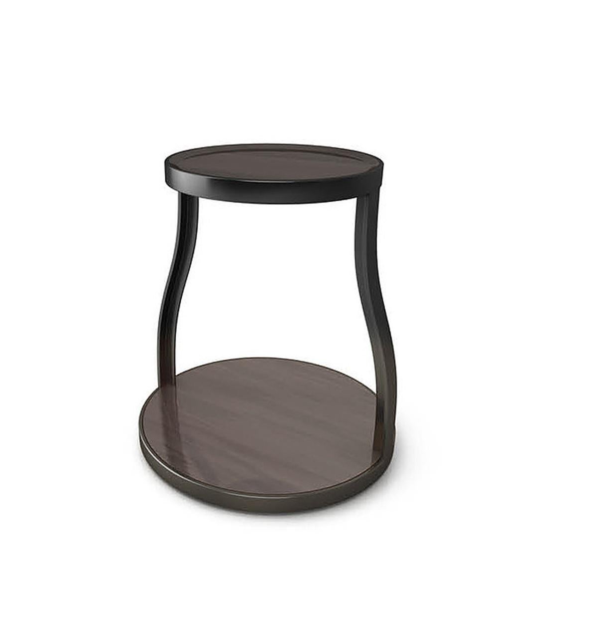 Axel side table by LK Edition
Dimensions: Diameter 42 x height 55 cm 
Materials: Walnut with a glossy varnish and, black metal. 

It is with the sense of detail and requirement, this research of the exception by the selection of noble materials