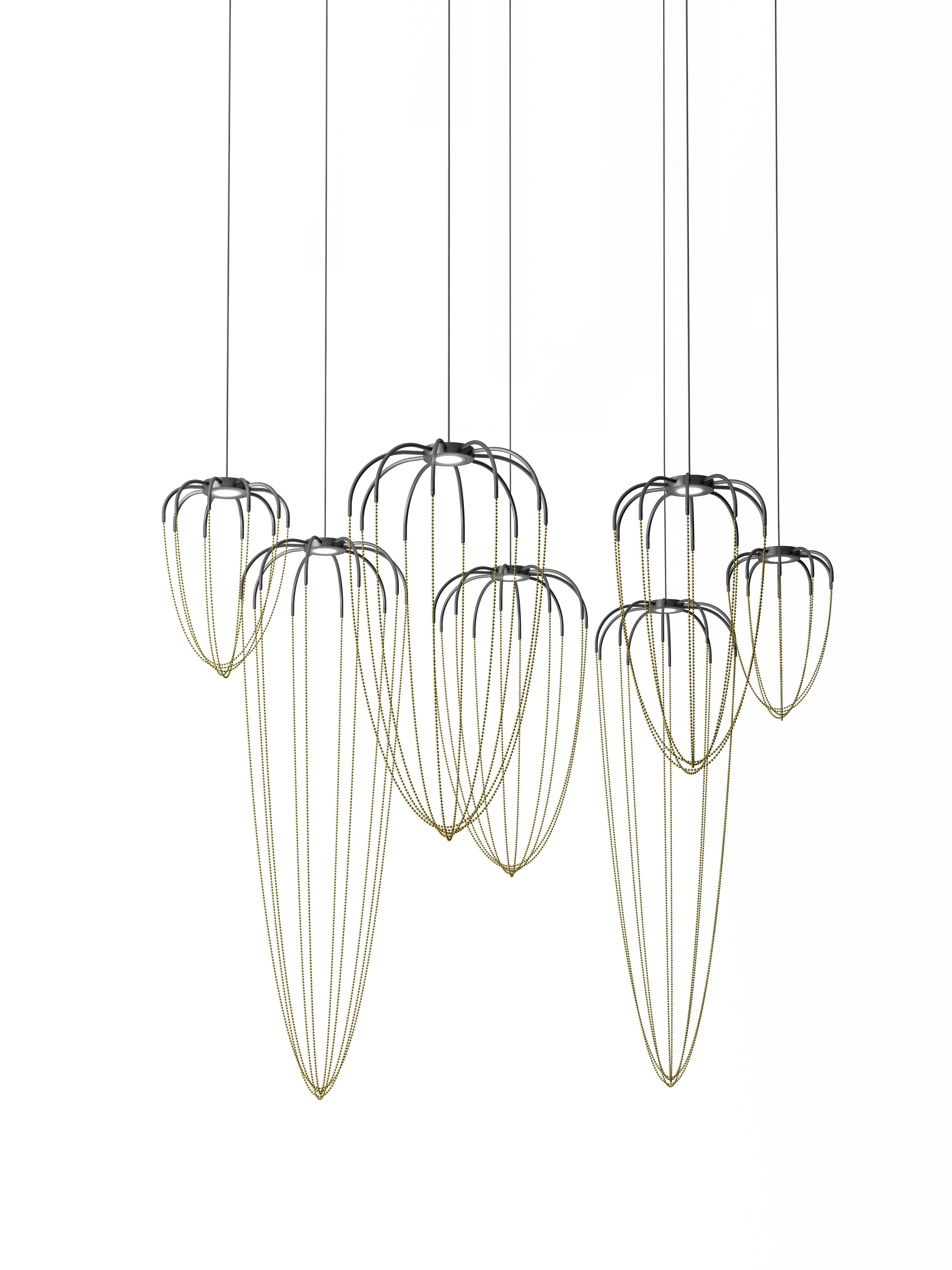 Axolight Alysoid Medium Pendant Lamp in Anthracite Grey Aluminum Body with Brass Chains by Ryosuke Fukusada

Precious spherical details chase each other with soft elegance and compose open signs in space. The refined volume of Alysoid lets itself be