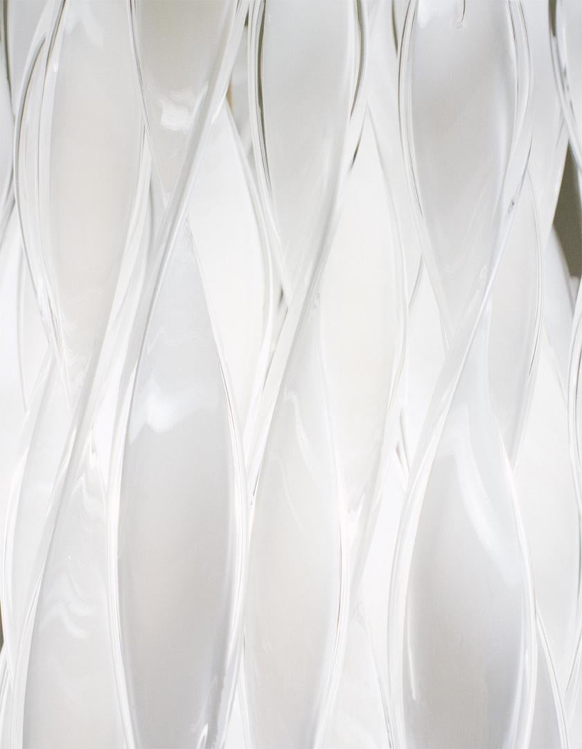 Axolight Avir Medium Ceiling Lamp in Chrome Steel Canopy and White by Manuel & Vanessa Vivian

Waves of light, dynamic reflections, uniqueness. The knowledge and craftsmanship of a master glassmaker express themselves in the shape of small glasses
