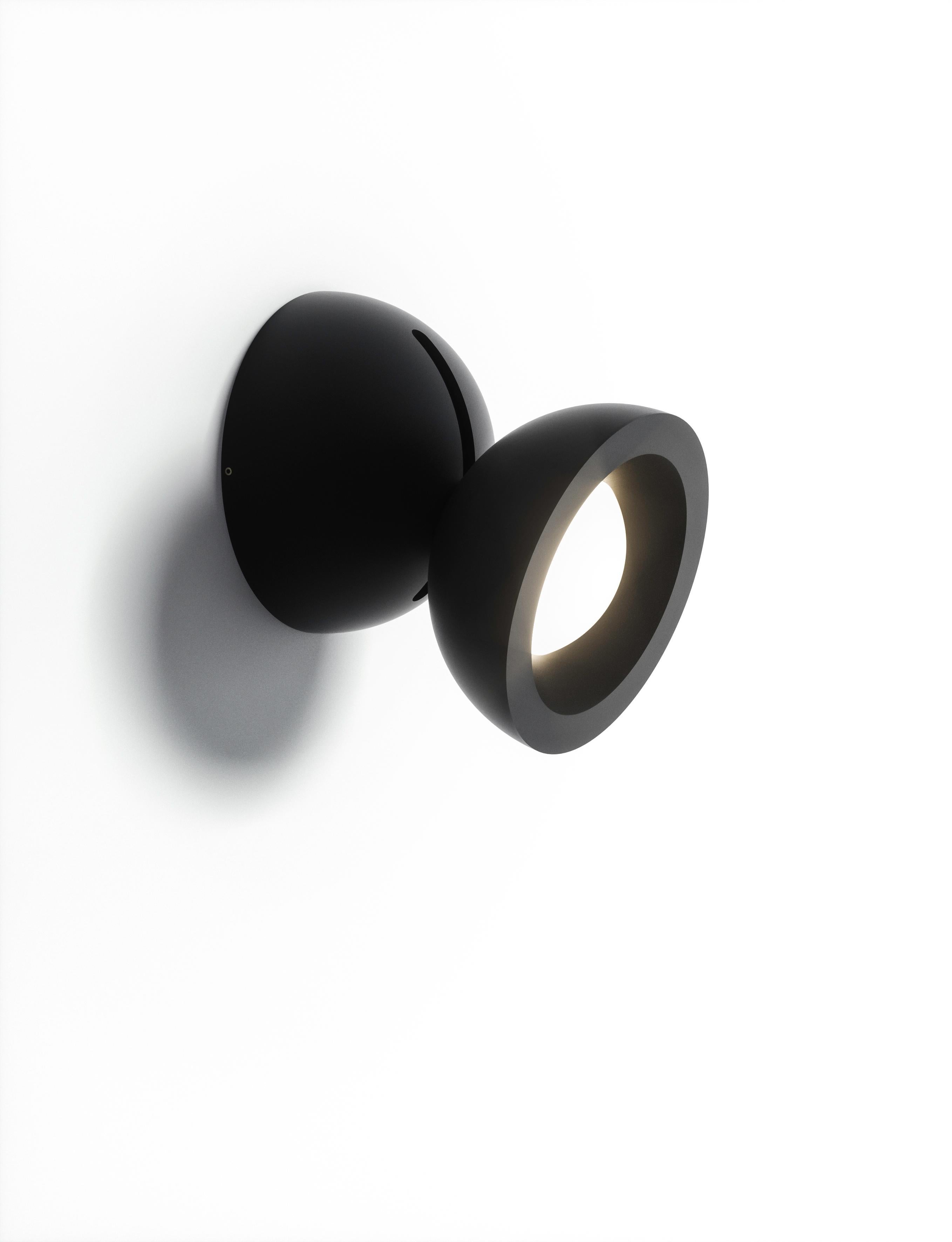 Axolight DoDot Wall/ Ceiling Light in Black Aluminum by Simone Micheli

DoDot, the latest creation of architect and designer Simone Micheli is the new adjustable lamp by Axolight, suitable for ceiling and wall

Compact and performing, DoDot is made