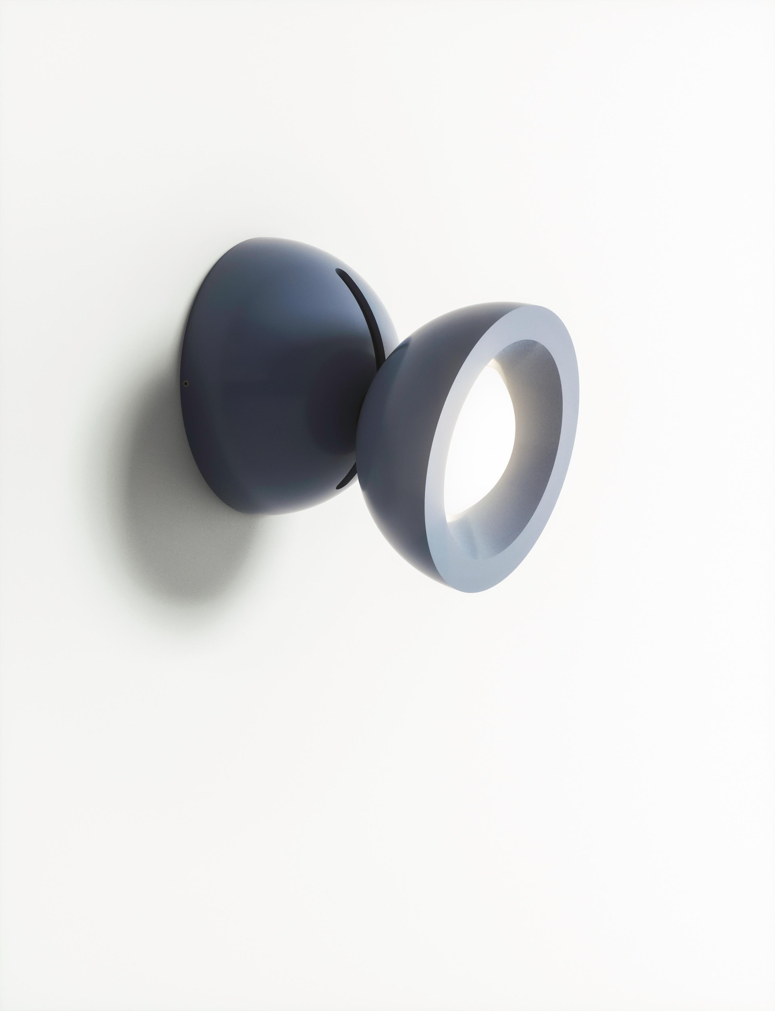 Axolight DoDot Wall/ Ceiling Light in Blue Aluminum by Simone Micheli

DoDot, the latest creation of architect and designer Simone Micheli is the new adjustable lamp by Axolight, suitable for ceiling and wall

Compact and performing, DoDot is made