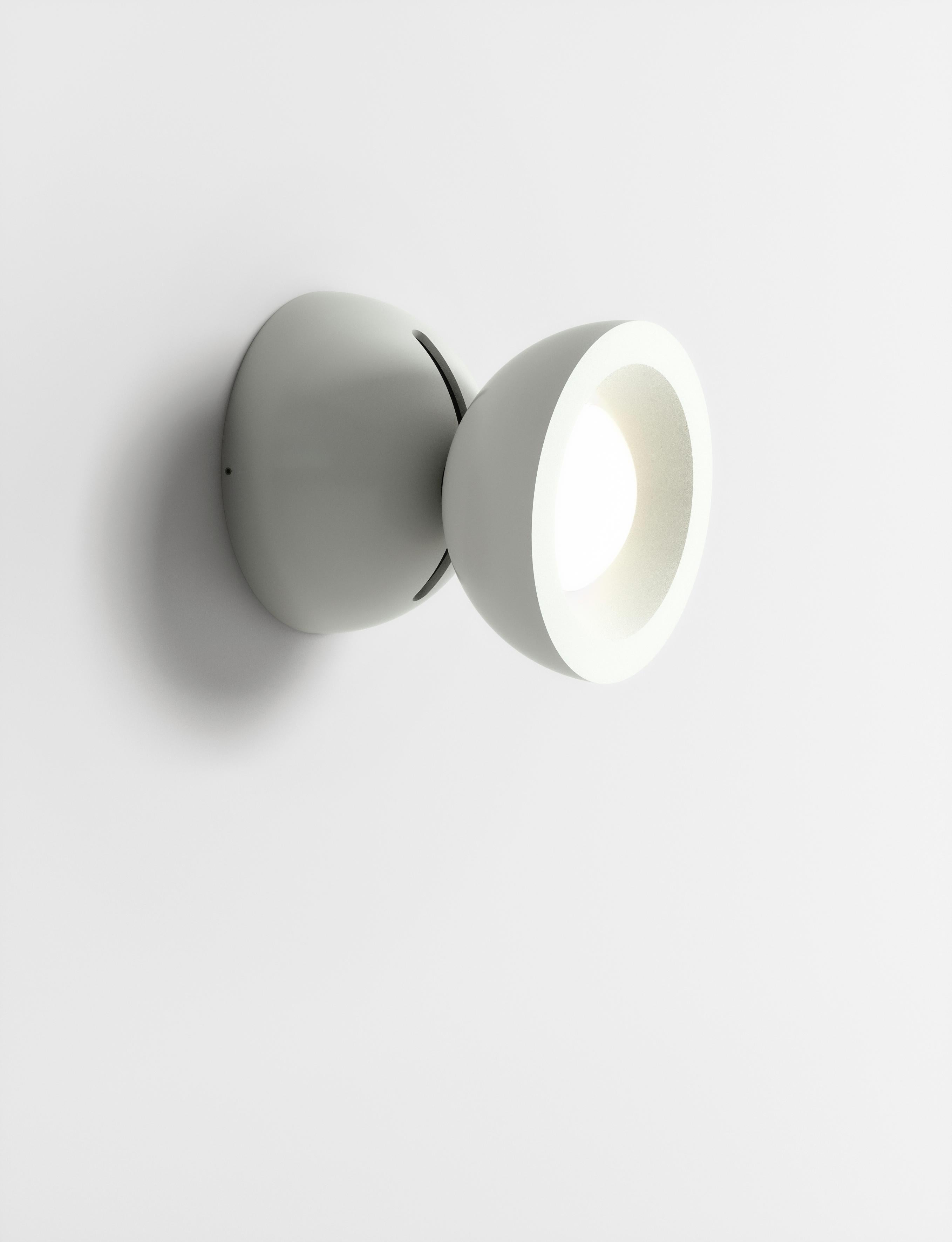 Axolight DoDot Wall/ Ceiling Light in White Aluminum by Simone Micheli

DoDot, the latest creation of architect and designer Simone Micheli is the new adjustable lamp by Axolight, suitable for ceiling and wall

Compact and performing, DoDot is made
